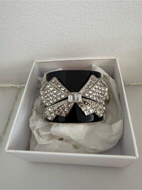 CHANEL Black Cuff Bracelet with Silver Crystal Bow